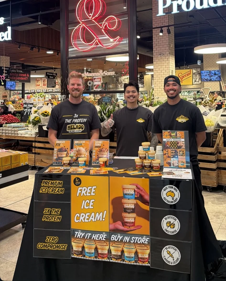 The Helado crew behind their sampling table at LaManna and Sons